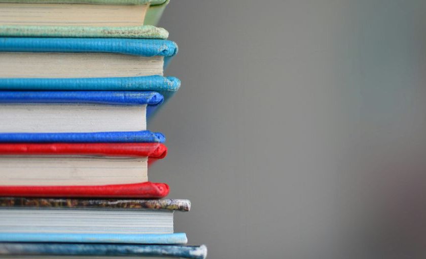 shallow focus photography of books